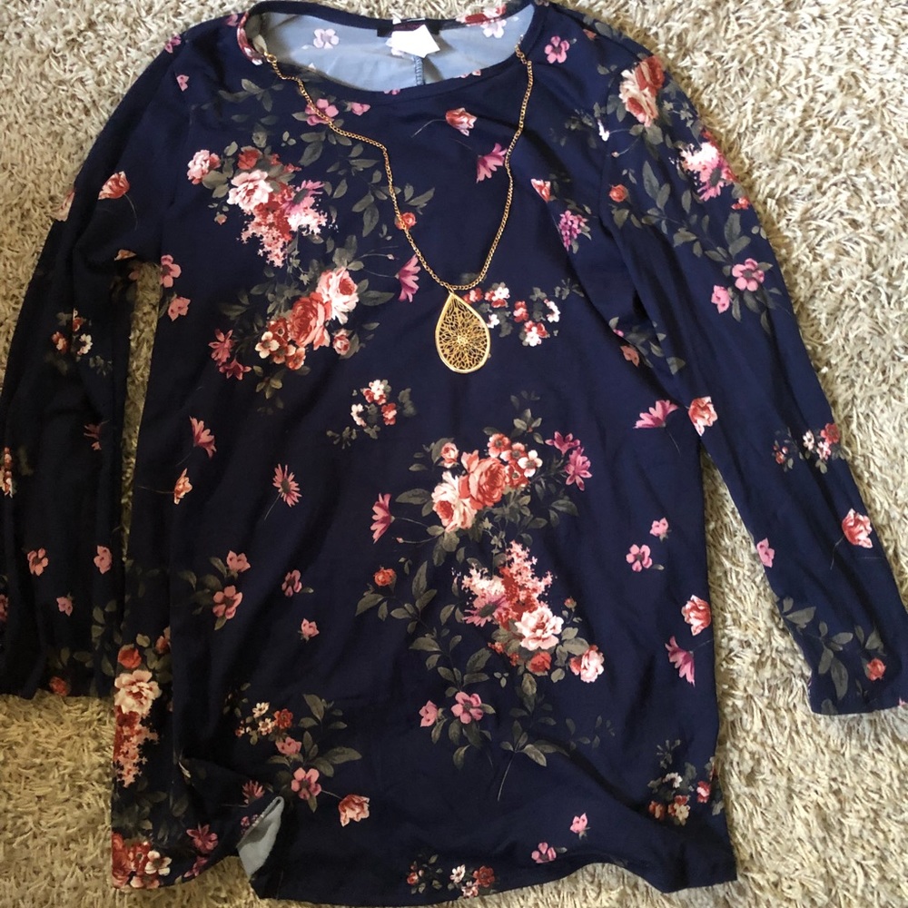 Women’s blouse with necklace attached
